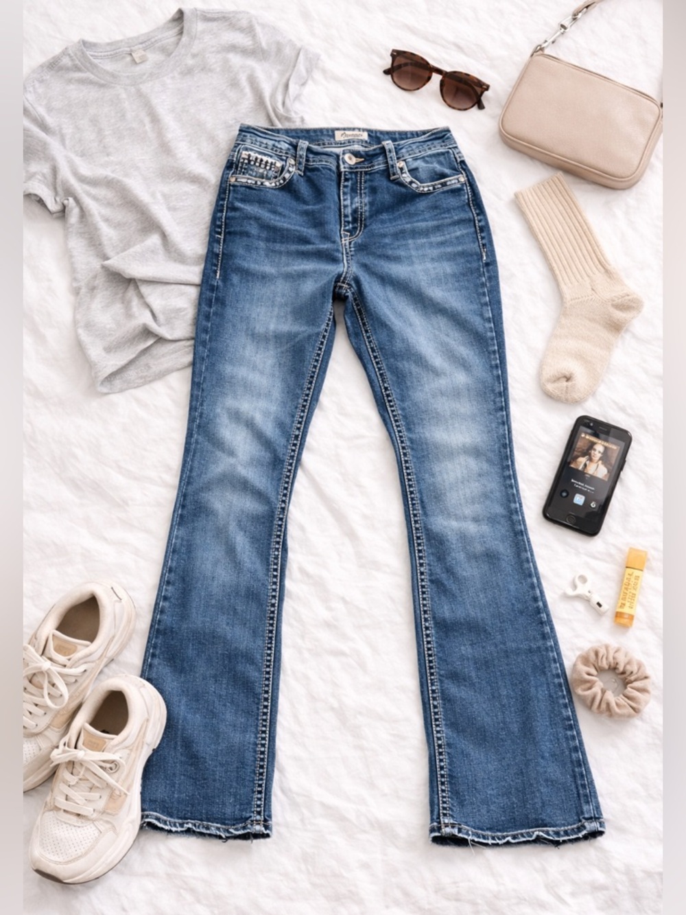 Charme brand women's jeans with embellished back pockets.